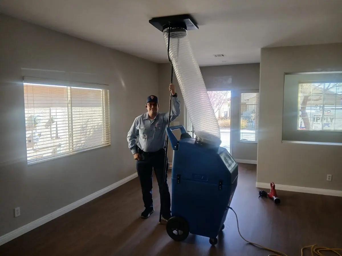Professional Dryer Vent Cleaning work inside a Hartland home